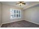 Neutral bedroom with window and shutter at 1810 Mariner Dr # 207, Tarpon Springs, FL 34689