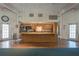 Spacious community kitchen with granite countertops, modern appliances, and ample cabinet space at 1810 Mariner Dr # 207, Tarpon Springs, FL 34689