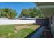 Backyard showcasing a long privacy fence and patio pavers at 1828 Stancel Dr, Clearwater, FL 33764