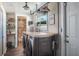 Functional laundry room with modern washer and dryer, a convenient countertop, and storage solutions at 1828 Stancel Dr, Clearwater, FL 33764