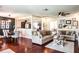 Open concept living and dining area boasts hardwood floors and neutral paint at 1828 Stancel Dr, Clearwater, FL 33764