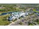 Aerial view of the Del Webb community clubhouse, pool, and recreational amenities at 19212 Iron Topsail Isle, Land O Lakes, FL 34638