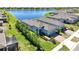 Beautiful exterior view featuring a modern home with a paver driveway and manicured landscaping at 19212 Iron Topsail Isle, Land O Lakes, FL 34638