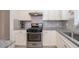 Bright kitchen featuring modern stainless steel appliances and ample counter space at 19212 Iron Topsail Isle, Land O Lakes, FL 34638
