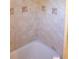 Angle of bathroom tub surrounded with tile at 2109 52Nd N Ave, St Petersburg, FL 33714