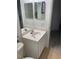 Updated bathroom with a bright vanity, and neutral-colored finishes throughout at 2327 Shirecrest Cove Way, Lutz, FL 33558