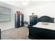 This bedroom is well lit, furnished with a modern wardrobe and classic furniture, offering style and comfort at 2327 Shirecrest Cove Way, Lutz, FL 33558