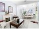 Open-concept living room blending seamlessly with a dining area, creating an inviting and spacious living space at 2327 Shirecrest Cove Way, Lutz, FL 33558
