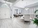 Open-concept living space with bright natural light, neutral tones, and an open floor plan at 2327 Shirecrest Cove Way, Lutz, FL 33558