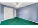 Bedroom featuring a closet, carpeted floors, and neutral wall color to create a relaxing atmosphere at 2329 Towering Oaks Cir, Seffner, FL 33584