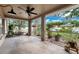 Spacious screened-in patio overlooking the lush backyard at 2329 Towering Oaks Cir, Seffner, FL 33584