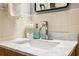 Close up of a bathroom sink with a marble countertop and modern faucet at 2461 Rhodesian Dr # 45, Clearwater, FL 33763
