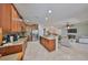 Well-equipped kitchen seamlessly connects to living and dining spaces, perfect for entertaining at 349 Laurel Falls Dr, Apollo Beach, FL 33572