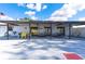 Spacious covered patio with picnic tables and chairs, perfect for outdoor entertaining at 36328 Bonney Dr, Zephyrhills, FL 33541