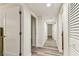 Hallway with neutral paint, plank flooring, and recessed lighting at 36750 Us 19 N # 08102, Palm Harbor, FL 34684