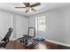 Versatile spare room with wood floors, neutral paint, providing space for work, fitness, or relaxation at 4506 W Beachway Dr, Tampa, FL 33609