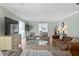 Bright living room showcasing neutral paint, hardwood floors, and a cozy setting at 4506 W Beachway Dr, Tampa, FL 33609