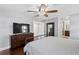 Spacious primary bedroom with wood floors, closet, and bathroom access for added convenience at 4506 W Beachway Dr, Tampa, FL 33609