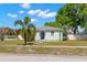 Charming single-story home with well-maintained lawn and a small palm tree in the front yard at 501 61St Ne Ave, St Petersburg, FL 33703