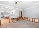 Open concept interior with exposed studs and pass through to the kitchen at 501 61St Ne Ave, St Petersburg, FL 33703
