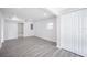 Freshly painted room with gray floors, a closet, and a window at 5411 96Th N Ter, Pinellas Park, FL 33782