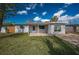 Charming single-story home featuring a well-maintained lawn and a cozy front porch area at 5411 96Th N Ter, Pinellas Park, FL 33782