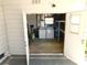 Utility room with laundry machines in the garage at 5546 Benton St, Zephyrhills, FL 33542