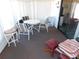 Sunroom with lots of windows and furnishings at 5546 Benton St, Zephyrhills, FL 33542
