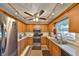 Updated kitchen featuring stainless steel appliances and ample countertop space at 672 Allegheny Dr, Sun City Center, FL 33573