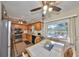 Bright kitchen with stainless appliances and view of the pool at 672 Allegheny Dr, Sun City Center, FL 33573