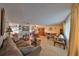 Open living room showcasing hardwood floors and the dining area at 672 Allegheny Dr, Sun City Center, FL 33573