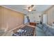 Inviting living room with wood-look floors, ceiling fan, and comfortable seating at 672 Allegheny Dr, Sun City Center, FL 33573