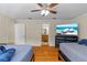 Relaxing bedroom boasts twin beds with convenient access to the en-suite bathroom at 705 S West Shore Blvd, Tampa, FL 33609