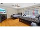 Comfortable bedroom features twin beds, wood floors and a television at 705 S West Shore Blvd, Tampa, FL 33609