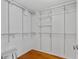Walk-in closet with organized shelving for ample storage at 705 S West Shore Blvd, Tampa, FL 33609