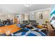 Spacious living room featuring an open floor plan, hardwood floors, and modern decor at 705 S West Shore Blvd, Tampa, FL 33609