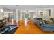 Open floor plan showcasing the dining and living areas with hardwood floors at 705 S West Shore Blvd, Tampa, FL 33609