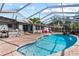 Beautiful pool and patio area surrounded by a screened enclosure, ideal for outdoor living at 705 S West Shore Blvd, Tampa, FL 33609