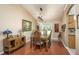 Dining room featuring wooden table, light fixture, and hardwood floors at 7182 Griffin Rd, Brooksville, FL 34601
