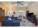 Comfortable living room with a large sectional, plush rug, and a bright window seat offering natural light at 7182 Griffin Rd, Brooksville, FL 34601