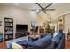 Expansive living area with high ceilings, hardwood floors, and an open layout connecting the living and dining spaces at 7182 Griffin Rd, Brooksville, FL 34601