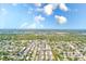 Expansive aerial view featuring the community and water creating a picturesque residential setting at 8066 Brentwood Rd # 8066, Seminole, FL 33777