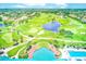 Expansive aerial view of a golf course community, complete with lush greenery, water features, and manicured landscapes at 8066 Brentwood Rd # 8066, Seminole, FL 33777