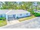 Charming single-story home with a well-maintained exterior and attached garage in a serene neighborhood at 8066 Brentwood Rd # 8066, Seminole, FL 33777