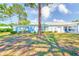 Charming single-story home with well-maintained lawn and mature trees, creating a peaceful and inviting atmosphere at 8066 Brentwood Rd # 8066, Seminole, FL 33777
