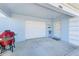 Blue home with white trim, a garage, and a red grill at 8066 Brentwood Rd # 8066, Seminole, FL 33777