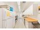 Functional kitchen space with ample counter space, modern appliances, and plenty of storage cabinets at 8066 Brentwood Rd # 8066, Seminole, FL 33777