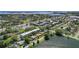 Picturesque aerial view showcasing the community, surrounding landscape, and waterfront at 9940 47Th N Ave # 210, St Petersburg, FL 33708