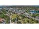 Overhead view showcasing the community near waterfront, roadways, and open spaces at 9940 47Th N Ave # 210, St Petersburg, FL 33708