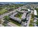 Aerial view of the condo community near the lake, showcasing its location and surrounding landscape at 9940 47Th N Ave # 210, St Petersburg, FL 33708